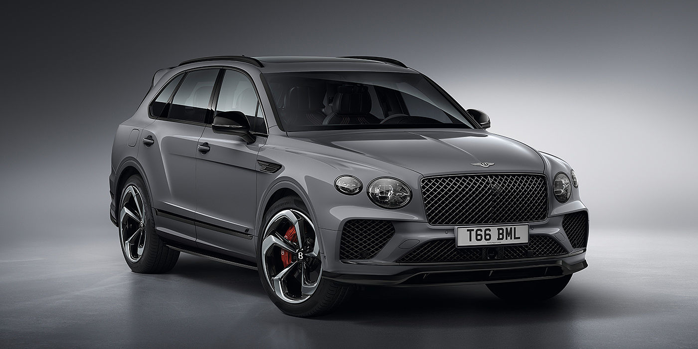 Bentley Beijing - Wukesong Bentley Bentayga S in Cambrian Grey paint front three - quarter view with dark chrome matrix grille and featuring elliptical LED matrix headlights. 