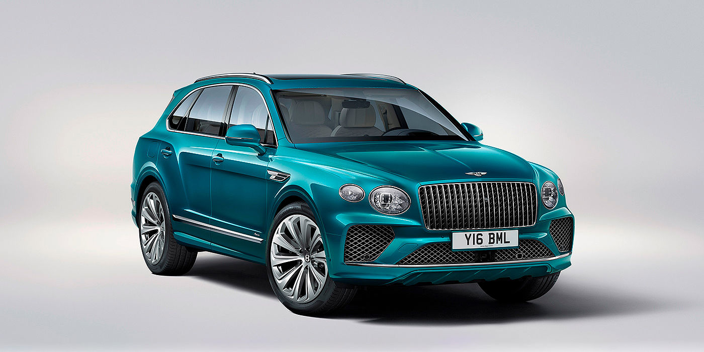 Bentley Beijing - Wukesong Bentley Bentayga Azure front three-quarter view, featuring a fluted chrome grille with a matrix lower grille and chrome accents in Topaz blue paint.