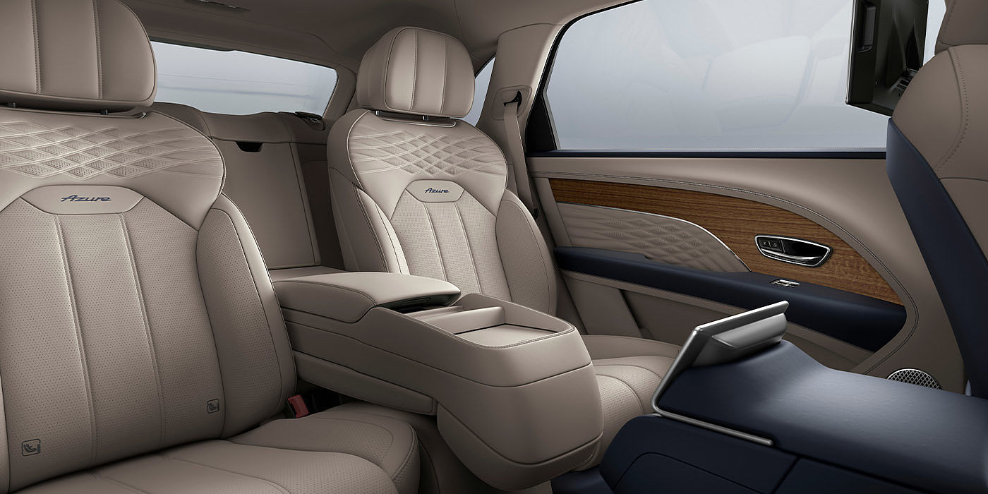 Bentley Beijing - Wukesong Bentley Bentayga EWB Azure interior view for rear passengers with Portland hide featuring Azure Emblem in Imperial Blue contrast stitch.