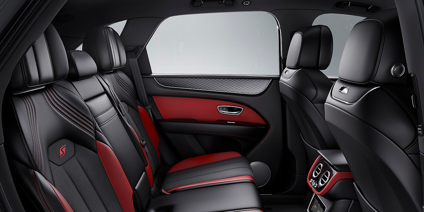 Bentley Beijing - Wukesong Bentey Bentayga S interior view for rear passengers with Beluga black and Hotspur red coloured hide.