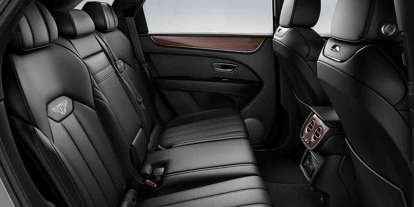 Bentley Beijing - Wukesong Bentley Bentayga EWB interior view for rear passengers with Beluga black hide.